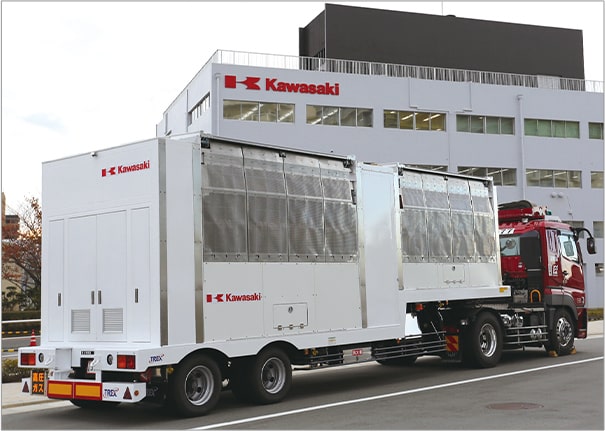Compressed gaseous hydrogen trailer with composite cylinders